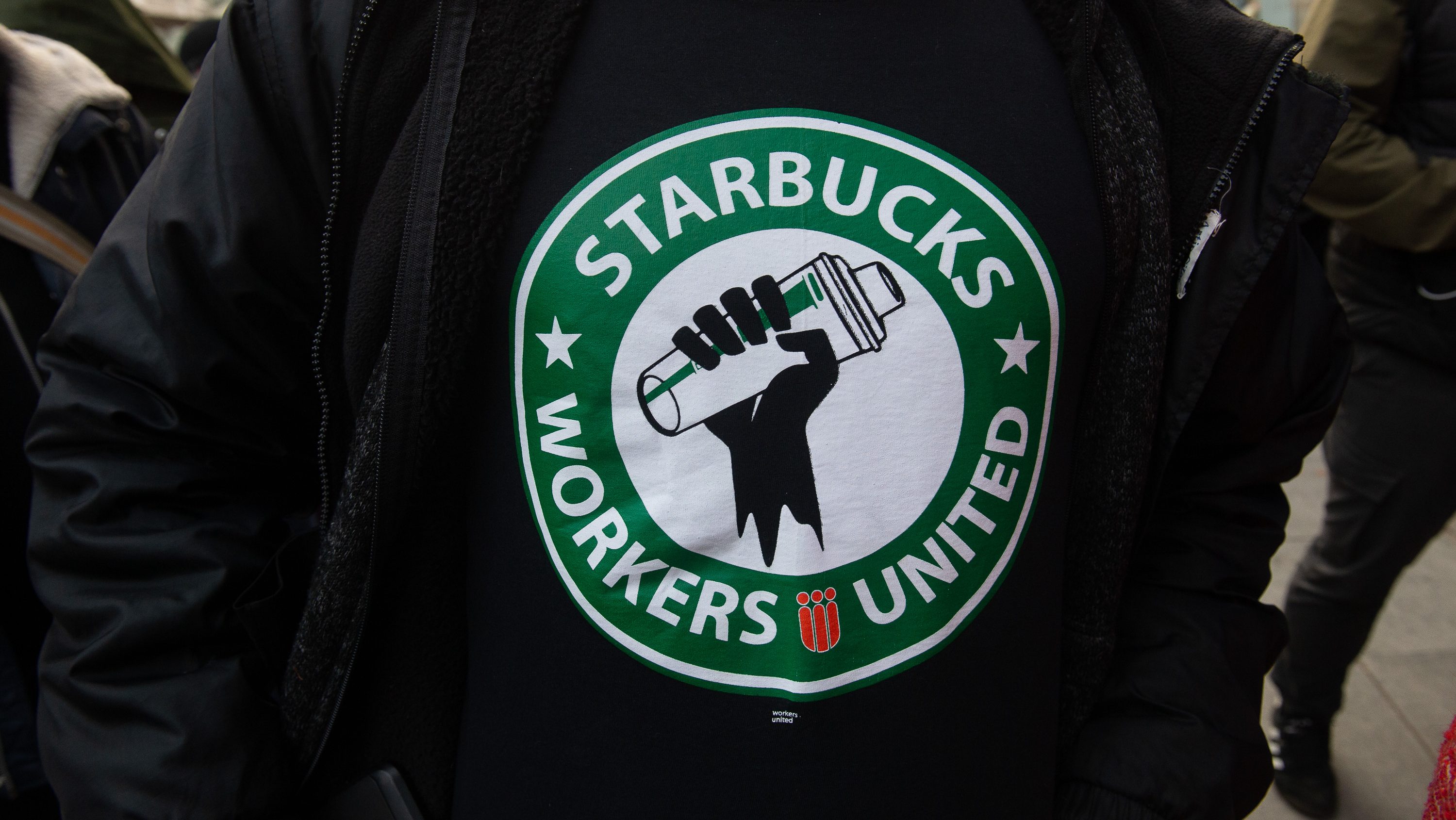 Starbucks Workers United logo on a shirt